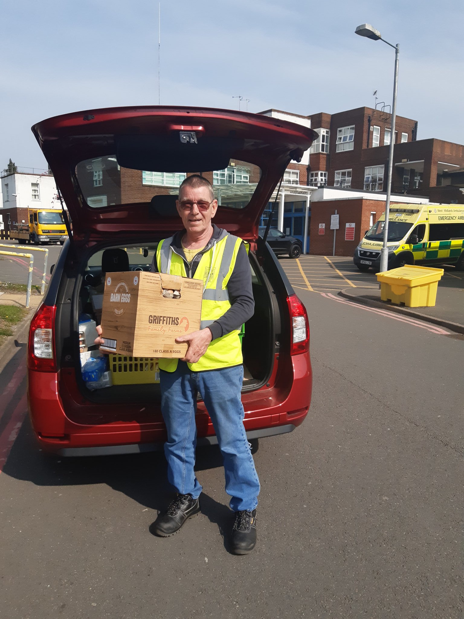 Volunteer Carrying Boxes